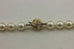 14k yellow gold 19 inch round white cultured pearl 7.5-8mm necklace high luster