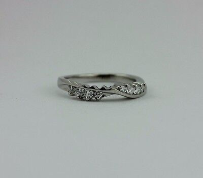 Platinum twist .27 ctw round graduated diamond wedding ring band part of set VVS