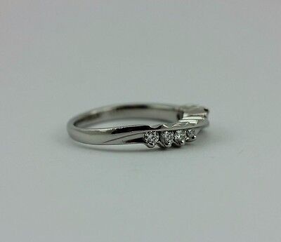 Platinum twist .27 ctw round graduated diamond wedding ring band part of set VVS