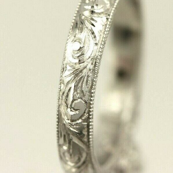 Platinum engagement ring cathedral semi mount lotus engraved diamond accents