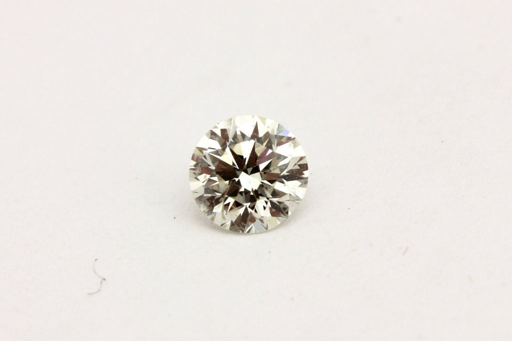 GIA natural diamond 0.50ct round brilliant K I2 Very Good 5.00-5.04x3.19mm