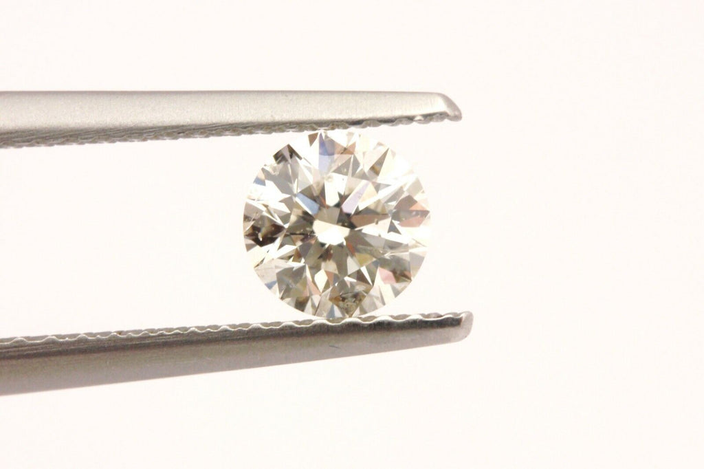 GIA natural diamond 0.50ct round brilliant K I2 Very Good 5.00-5.04x3.19mm