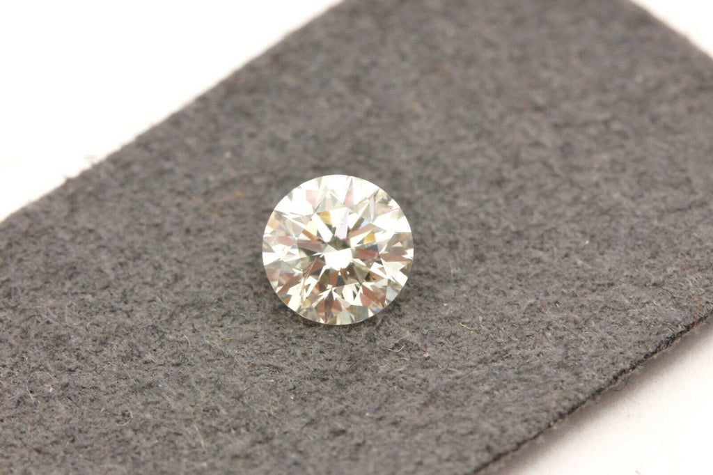 GIA natural diamond 0.50ct round brilliant K I2 Very Good 5.00-5.04x3.19mm