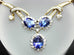 18k yellow gold 18 inch necklace 8 ctw oval Tanzanite 2 ctw round Diamond estate