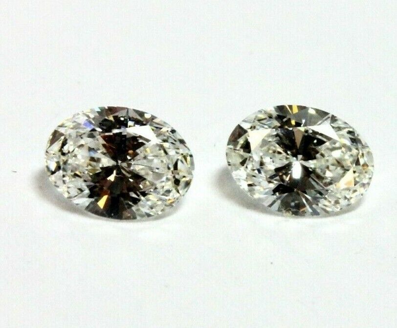 matched pair oval diamonds 0.76ctw 5.57x4.10x2.50mm 5.56x4.21x2.45mm G VS1-2 NEW