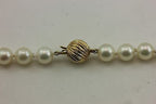 14k yellow gold 19 inch round white cultured pearl 7.5-8mm necklace high luster