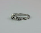 Platinum twist .27 ctw round graduated diamond wedding ring band part of set VVS