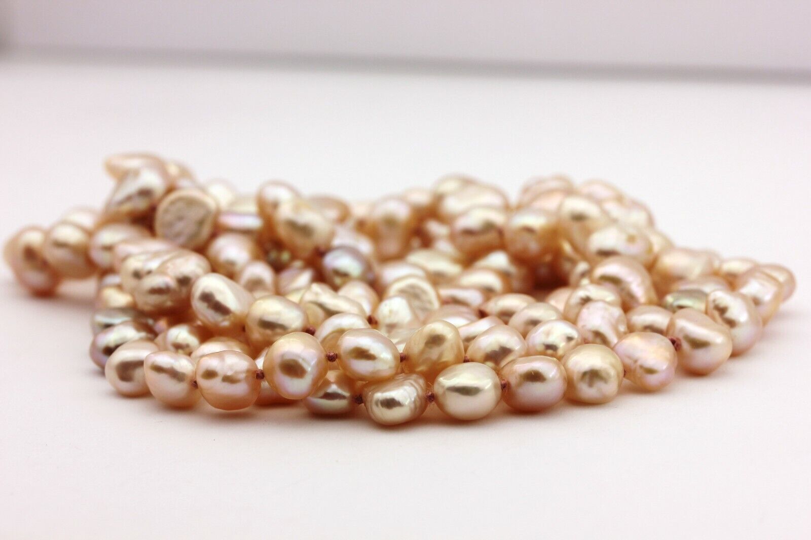 freshwater pearl strand necklace 34 inch pink baroque shapes 7-7.5mm 42.8g