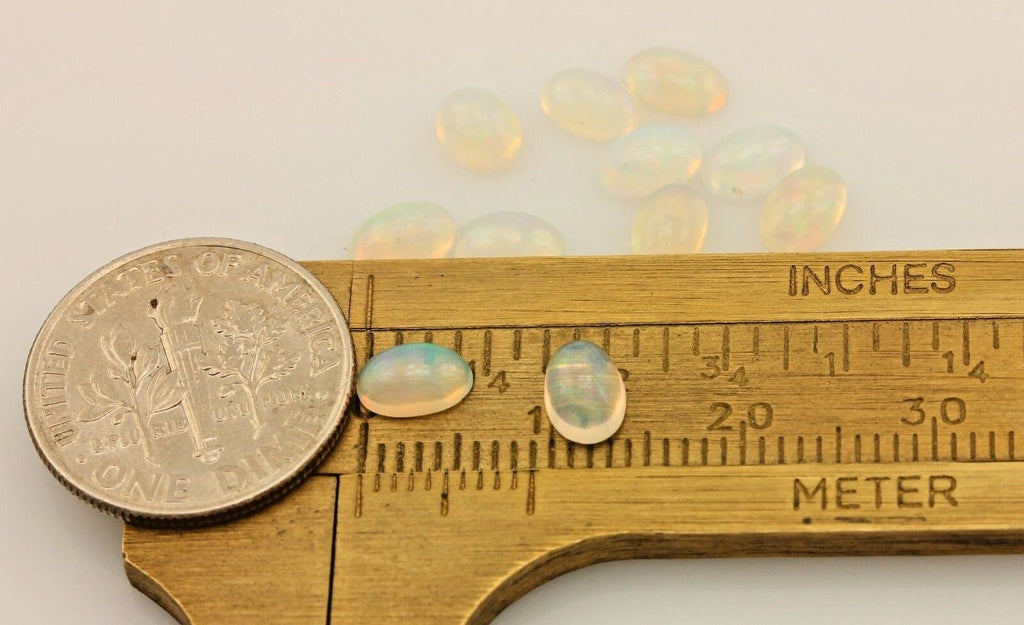 Ethiopian Jelly Opals lot 11 oval cabochons 6x4mm 3.16ctw NEW loose gemstones