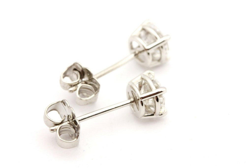 platinum 1.04ctw round brilliant diamond solitaire stud earrings 1.4g