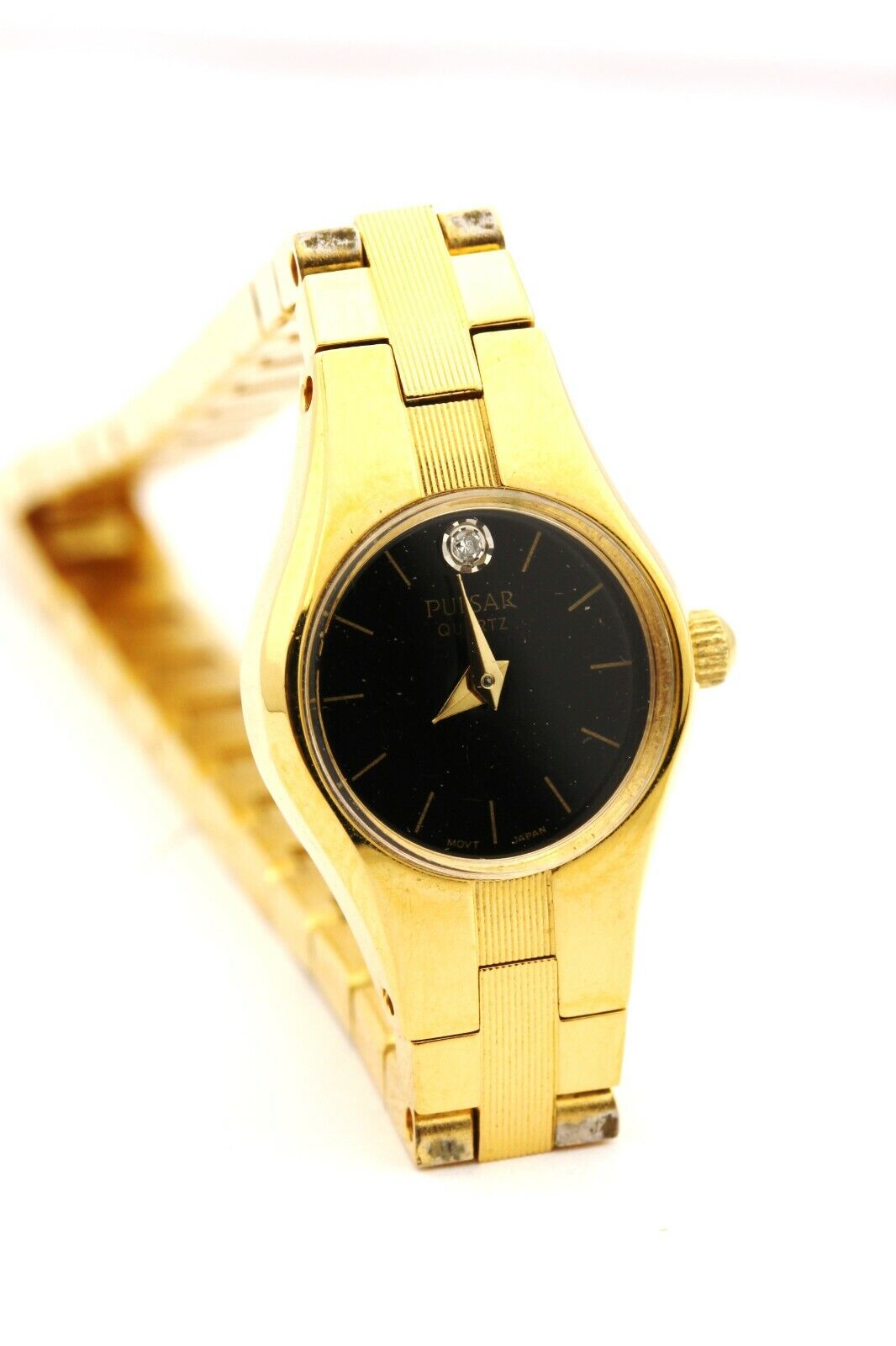 pulsar quartz watch stainless steel gold tone 6.5 inch 16mm round not working