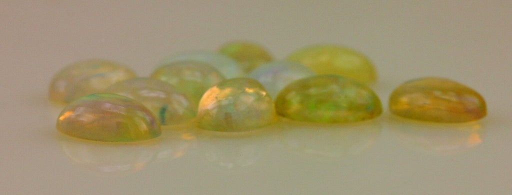 Ethiopian Jelly Opals lot 11 oval cabochons 6x4mm 3.16ctw NEW loose gemstones