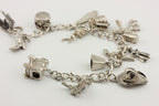 sterling silver charm bracelet cowboys native American southwest 32.5g 8 inch