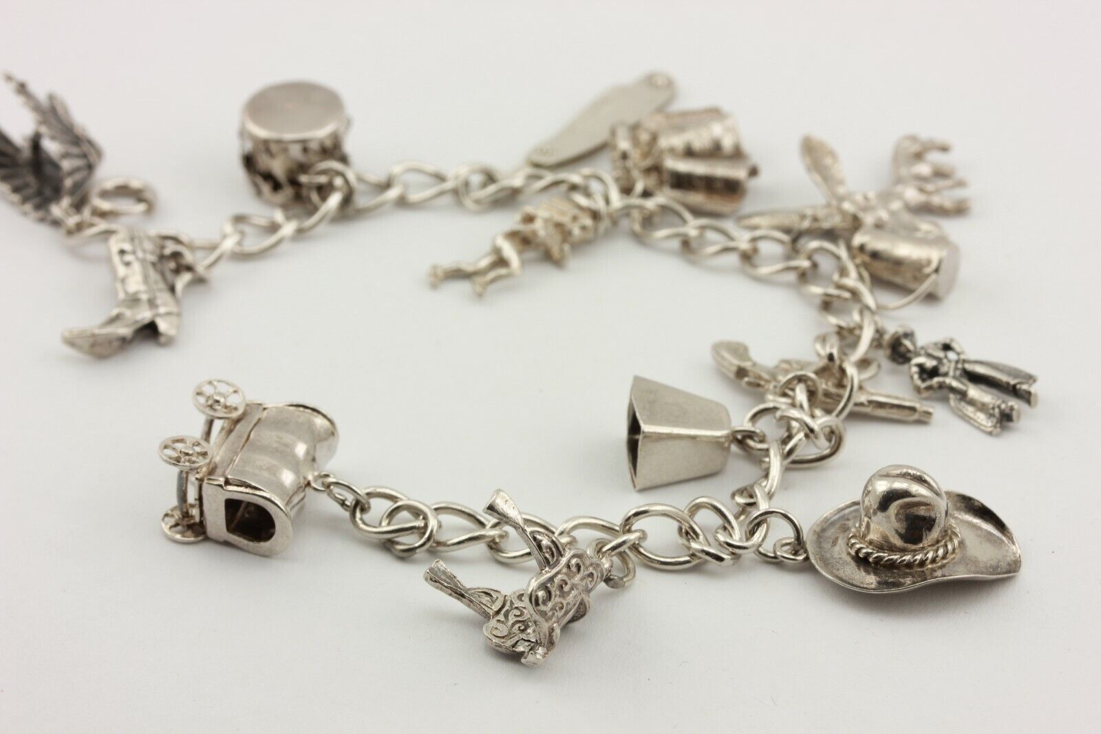 sterling silver charm bracelet cowboys native American southwest 32.5g 8 inch