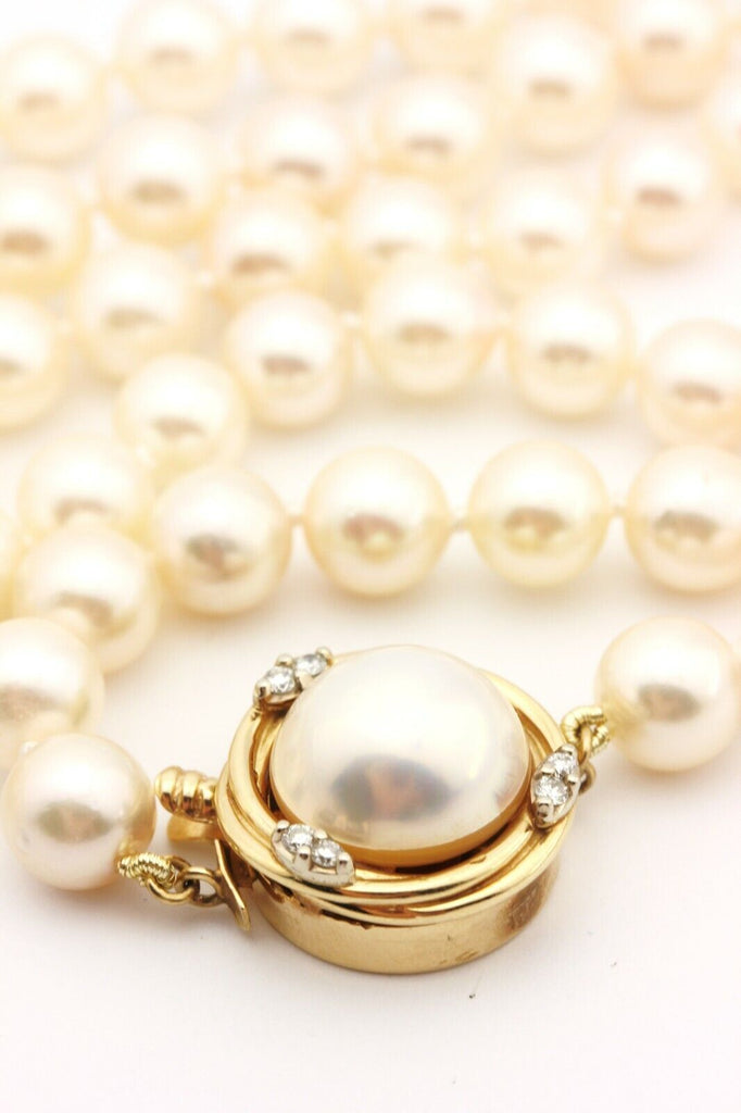 C. 1980 Vintage 6.5-8mm Cultured Pearl Necklace with .30 ct. t.w. Diamonds  in 14kt White Gold. 17