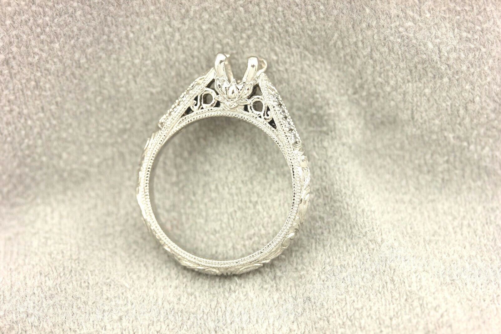 Platinum engagement ring cathedral semi mount lotus engraved diamond accents
