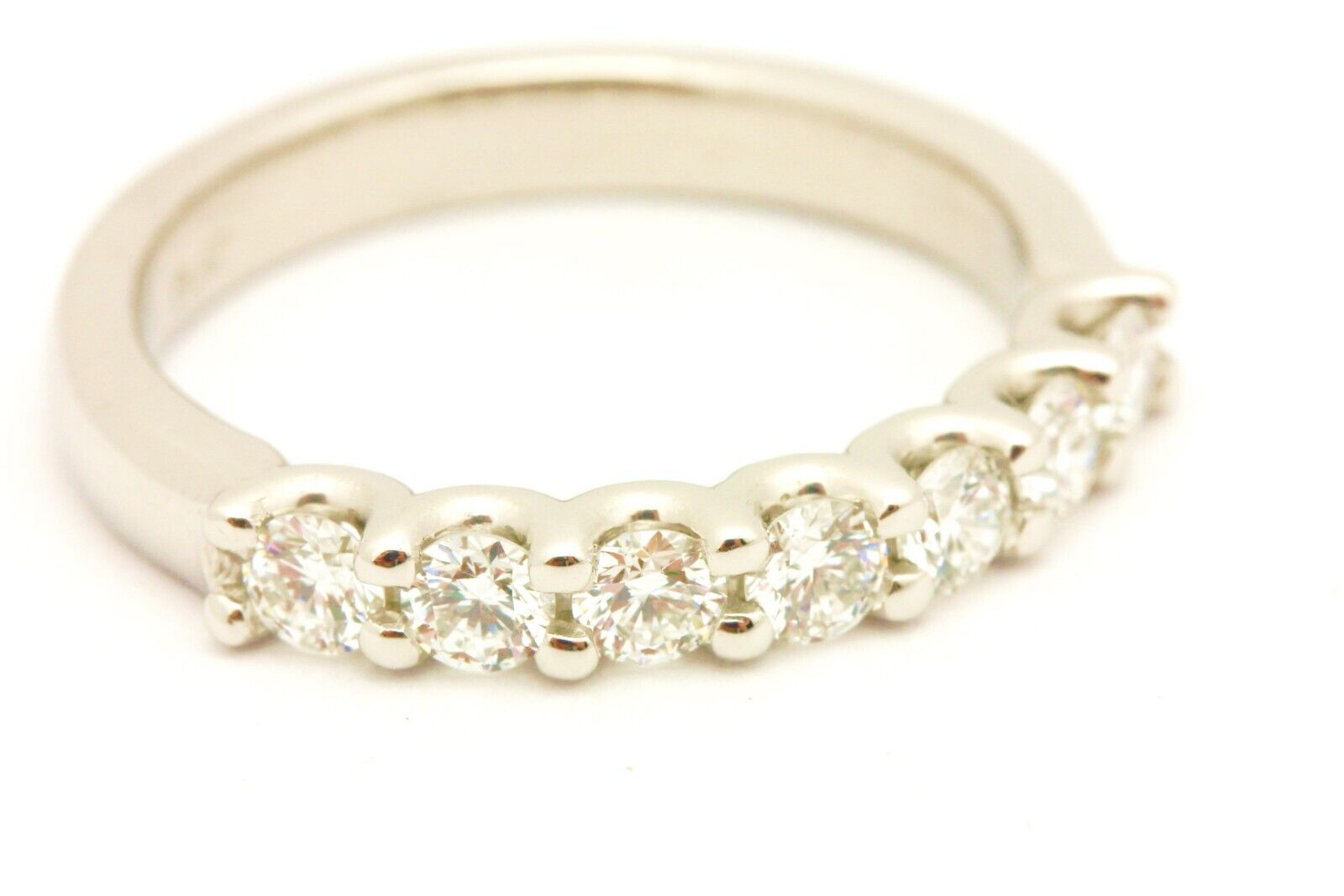 Platinum 0.66ctw natural round diamond 7 stone band 3mm ring size 7 6.35g new